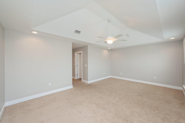 400 Mattie M Kelly Blvd Unit 7, Destin, FL 32541 - spare room featuring recessed lighting, light colored carpet, a raised ceiling, and a ceiling fan