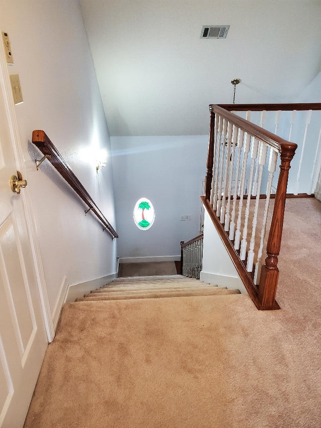 2969 Laurel Dr, Gulf Breeze, FL 32563 - stairway featuring carpet flooring and vaulted ceiling