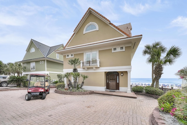 2905 Scenic Gulf Dr, Miramar Beach, FL 32550 - view of front of property featuring stucco siding and a water view