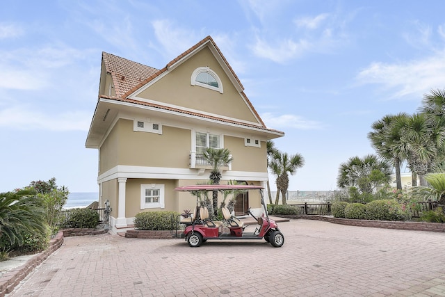 2905 Scenic Gulf Dr, Miramar Beach, FL 32550 - view of front facade with stucco siding and a tiled roof