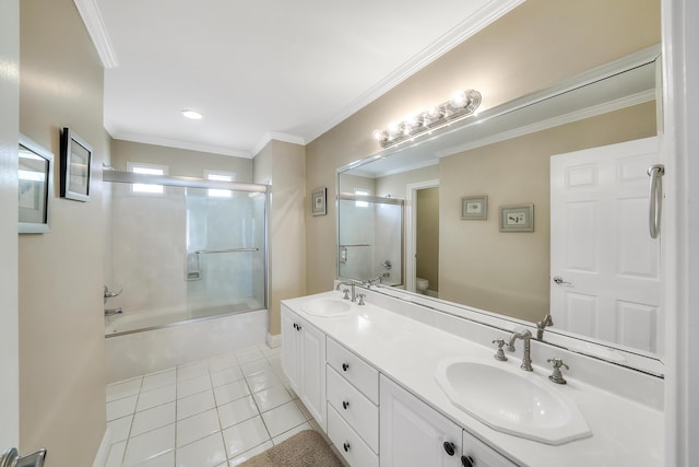 2905 Scenic Gulf Dr, Miramar Beach, FL 32550 - bathroom featuring tile patterned floors, bath / shower combo with glass door, double vanity, and crown molding