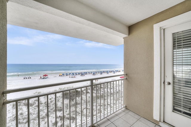 2905 Scenic Gulf Dr, Miramar Beach, FL 32550 - balcony featuring view of water and beach
