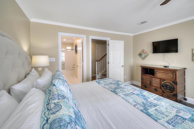 2905 Scenic Gulf Dr, Miramar Beach, FL 32550 - bedroom with ornamental molding and connected bathroom