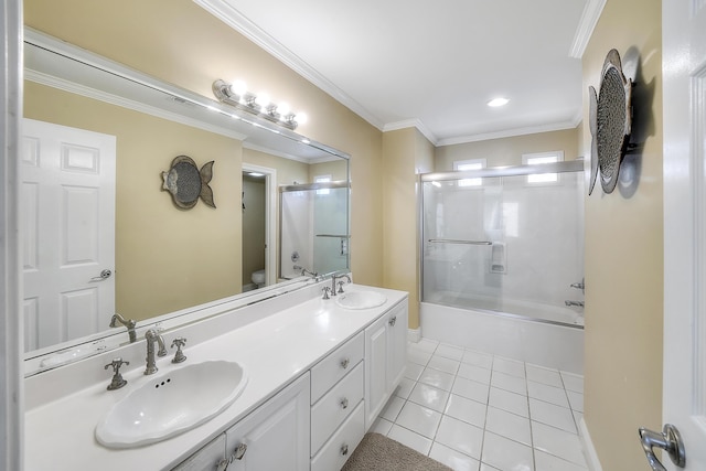 2905 Scenic Gulf Dr, Miramar Beach, FL 32550 - full bath featuring double vanity, tile patterned floors, ornamental molding, and enclosed tub / shower combo