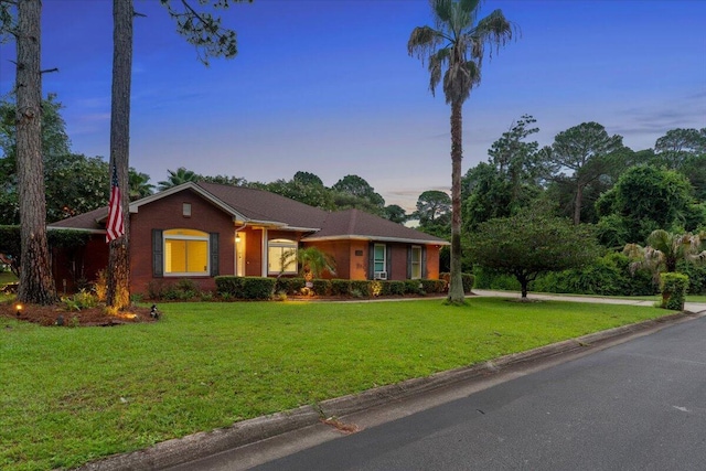2050 Biscayne Blvd, Navarre, FL 32566 - ranch-style house with a lawn