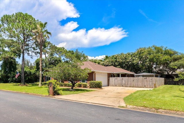 2050 Biscayne Blvd, Navarre, FL 32566 - view of front facade featuring a garage and driveway