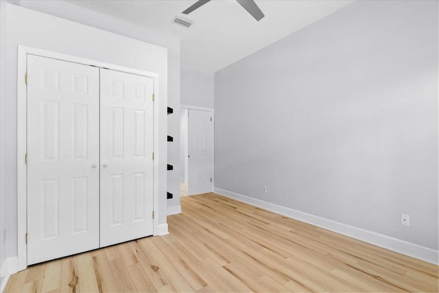 2050 Biscayne Blvd, Navarre, FL 32566 - unfurnished bedroom with light wood finished floors, a closet, and ceiling fan