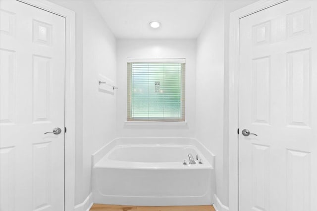 2050 Biscayne Blvd, Navarre, FL 32566 - full bath featuring a bath and baseboards