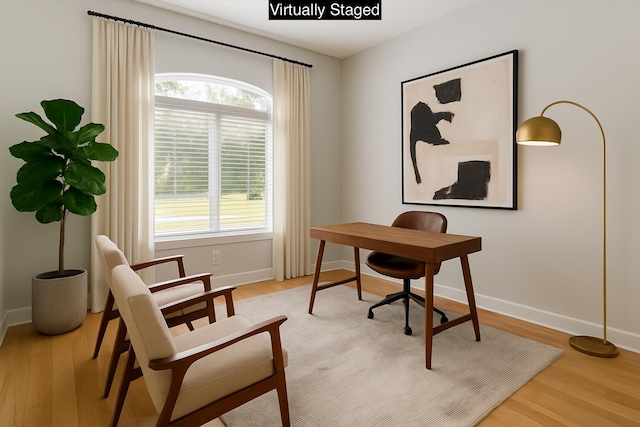 2050 Biscayne Blvd, Navarre, FL 32566 - home office featuring wood finished floors and plenty of natural light