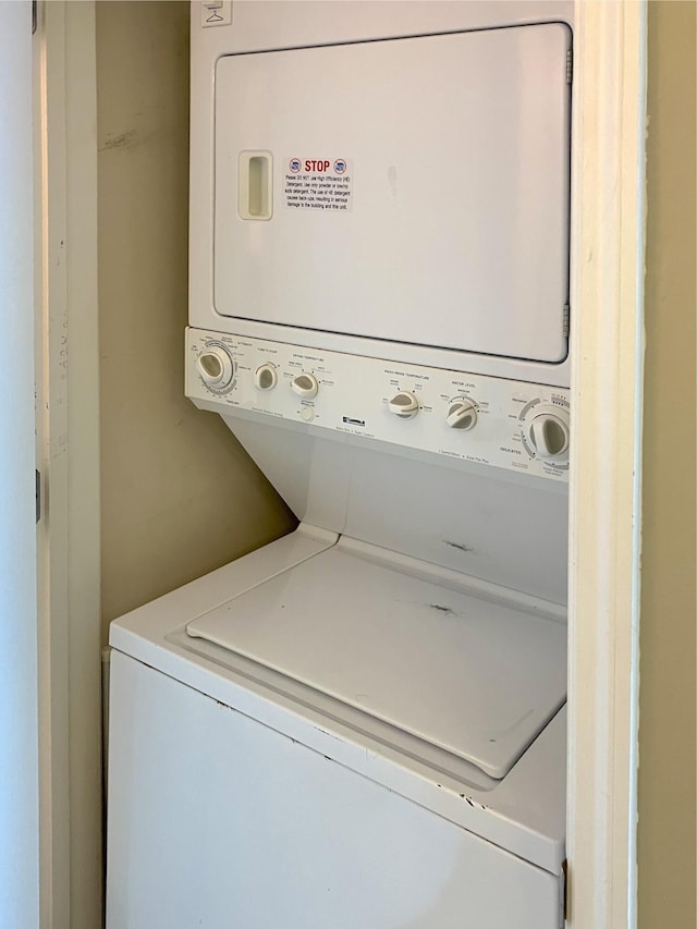 17757 Front Beach Rd Unit 2204D, Panama City Beach, FL 32413 - laundry room with estacked washer and dryer
