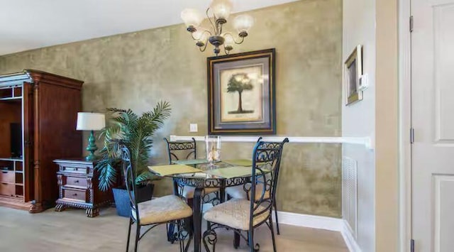 17757 Front Beach Rd Unit 2204D, Panama City Beach, FL 32413 - dining space featuring a chandelier