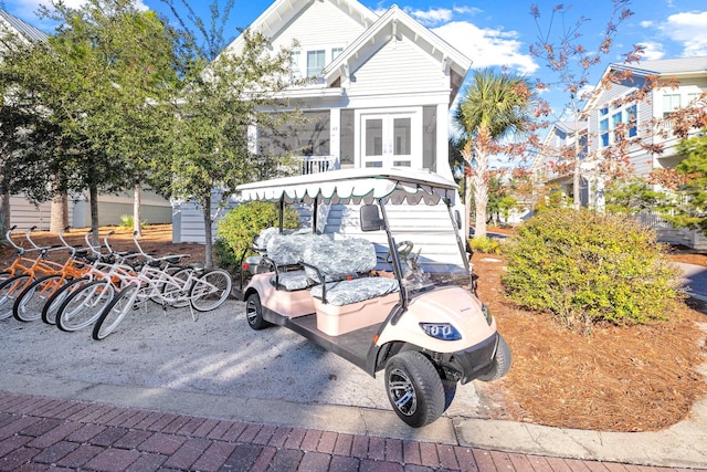 49 Clipper St, Inlet Beach, FL 32461 - view of front of house with a balcony and french doors