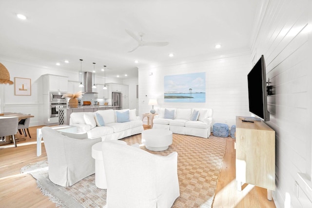 49 Clipper St, Inlet Beach, FL 32461 - living room with ornamental molding, a ceiling fan, recessed lighting, and light wood-style floors