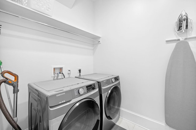 49 Clipper St, Inlet Beach, FL 32461 - washroom featuring washing machine and dryer and baseboards