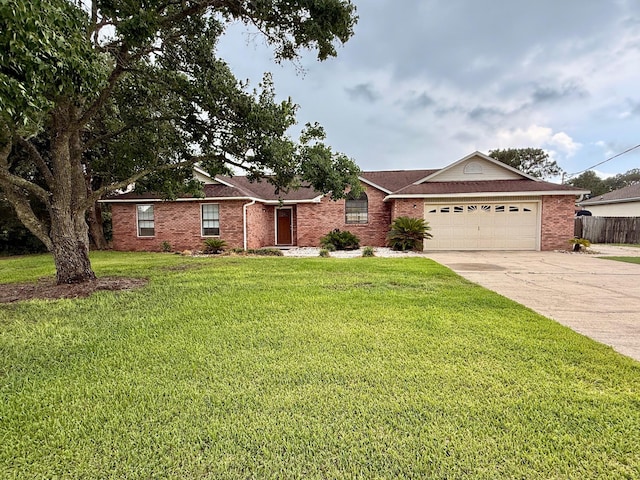 7167 Manatee St, Navarre, FL 32566 - ranch-style house with a garage, concrete driveway, and brick siding