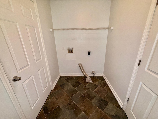 7167 Manatee St, Navarre, FL 32566 - laundry room featuring electric dryer hookup, dark stone finish floors, and washer hookup