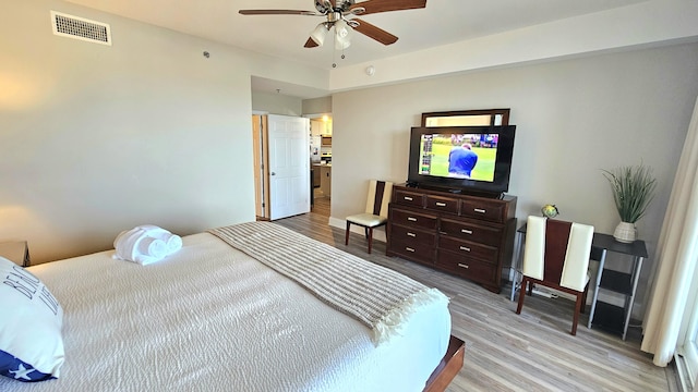 9902 S Thomas Dr Unit 933, Panama City Beach, FL 32408 - bedroom with light wood-type flooring