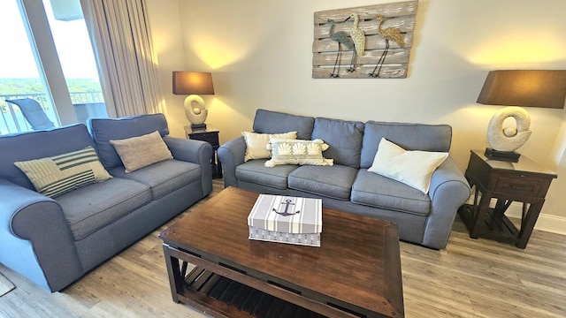 9902 S Thomas Dr Unit 933, Panama City Beach, FL 32408 - living area with light wood-style floors
