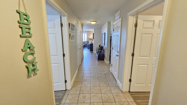 9902 S Thomas Dr Unit 933, Panama City Beach, FL 32408 - hall featuring light tile patterned floors