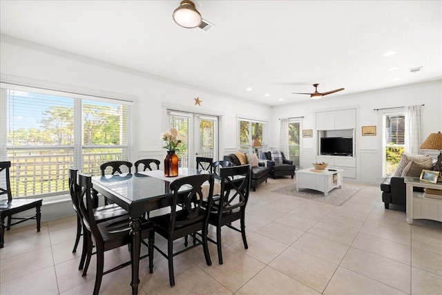 54 Rue Du Soleil, Santa Rosa Beach, FL 32459 - dining space featuring light tile patterned floors, a ceiling fan, recessed lighting, and ornamental molding