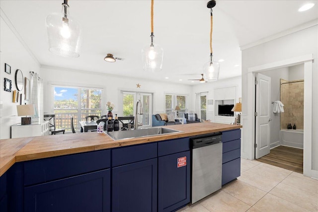 54 Rue Du Soleil, Santa Rosa Beach, FL 32459 - kitchen featuring wooden counters, stainless steel dishwasher, blue cabinets, a ceiling fan, and ornamental molding