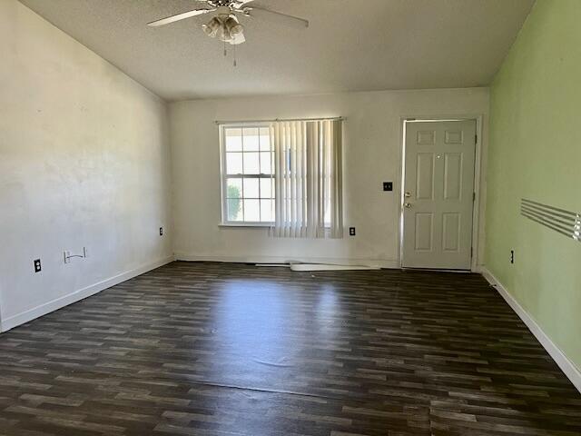 5151 Eagle Way, Crestview, FL 32539 - empty room featuring ceiling fan and wood finished floors