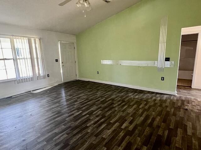 5151 Eagle Way, Crestview, FL 32539 - spare room featuring dark wood-style floors, a ceiling fan, and lofted ceiling