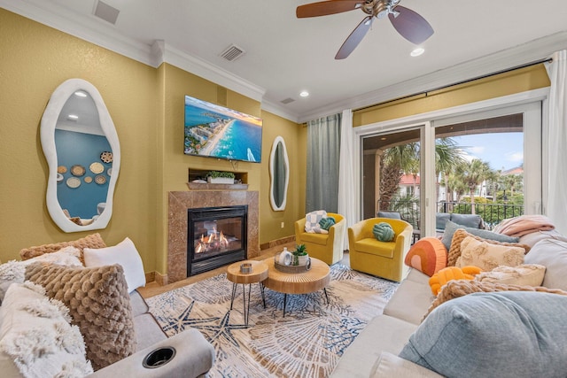 37 Conch Cay, Destin, FL 32541 - living room featuring crown molding, a tile fireplace, ceiling fan, and recessed lighting