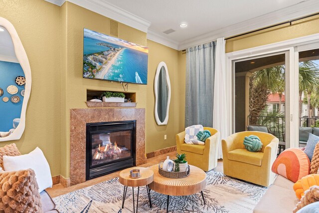 37 Conch Cay, Destin, FL 32541 - sitting room with a high end fireplace, crown molding, and recessed lighting