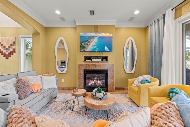 37 Conch Cay, Destin, FL 32541 - living room with crown molding, a tile fireplace, and recessed lighting