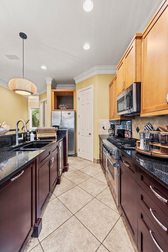 37 Conch Cay, Destin, FL 32541 - kitchen featuring stainless steel appliances, ornamental molding, open shelves, decorative backsplash, and dark stone countertops