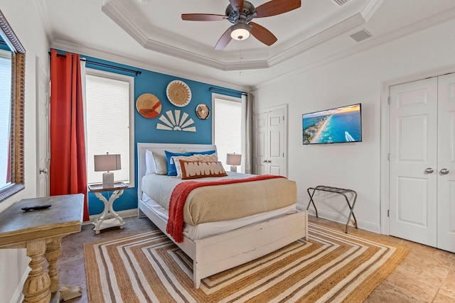 37 Conch Cay, Destin, FL 32541 - bedroom featuring crown molding, a raised ceiling, ceiling fan, multiple closets, and tile patterned flooring