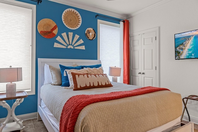 37 Conch Cay, Destin, FL 32541 - bedroom with ornamental molding and a closet