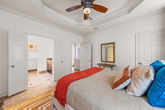 37 Conch Cay, Destin, FL 32541 - bedroom with crown molding, a tray ceiling, light tile patterned flooring, ensuite bath, and ceiling fan