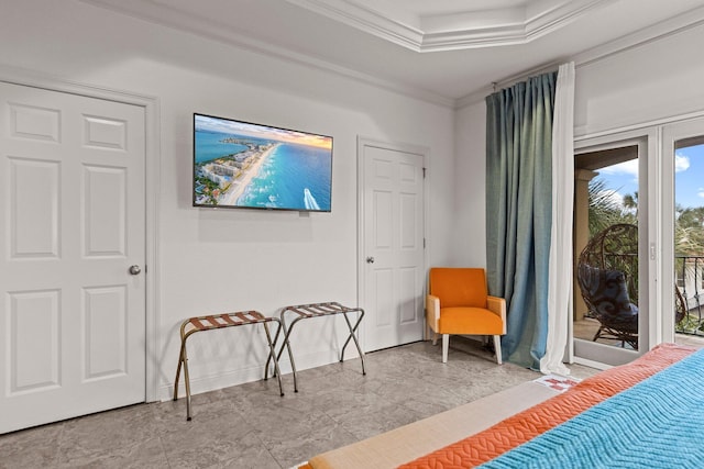 37 Conch Cay, Destin, FL 32541 - bedroom with access to exterior, ornamental molding, marble look tiles, and a raised ceiling