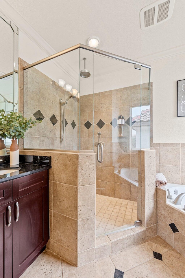 37 Conch Cay, Destin, FL 32541 - full bath with vanity, a shower stall, tile walls, a bath, and crown molding