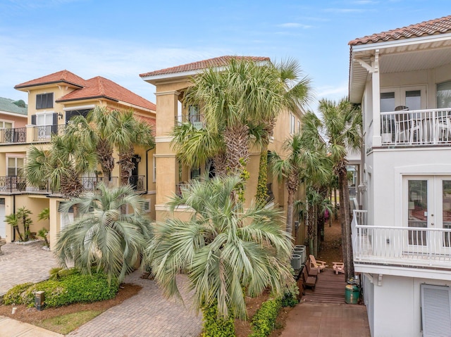 37 Conch Cay, Destin, FL 32541 - view of front of property featuring stucco siding, a tile roof, and a balcony
