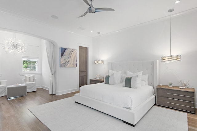 37 Sugar Loaf Aly, Alys Beach, FL 32461 - bedroom with wood finished floors, ceiling fan, recessed lighting, and ornamental molding