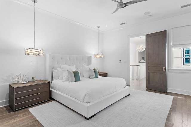 37 Sugar Loaf Aly, Alys Beach, FL 32461 - bedroom with wood finished floors, ceiling fan, and crown molding
