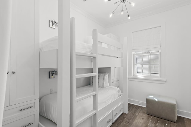 37 Sugar Loaf Aly, Alys Beach, FL 32461 - bedroom with ornamental molding, a chandelier, and dark wood-style floors