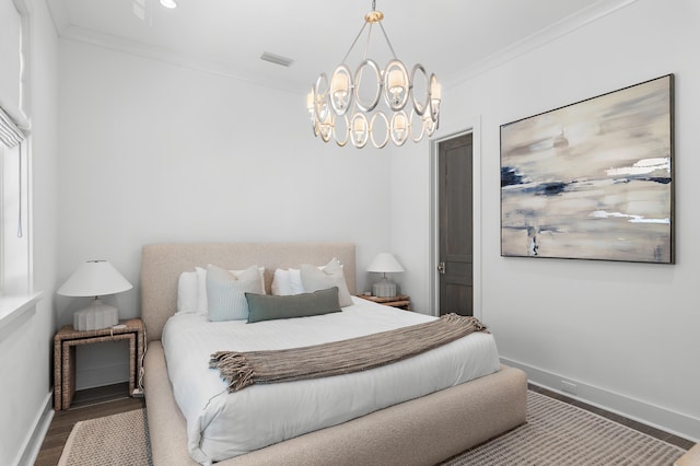 37 Sugar Loaf Aly, Alys Beach, FL 32461 - bedroom with wood finished floors, crown molding, and a chandelier