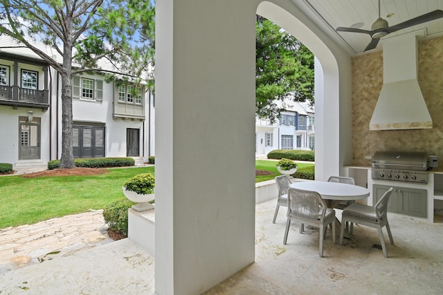 37 Sugar Loaf Aly, Alys Beach, FL 32461 - view of patio / terrace featuring outdoor dining space, exterior kitchen, and ceiling fan