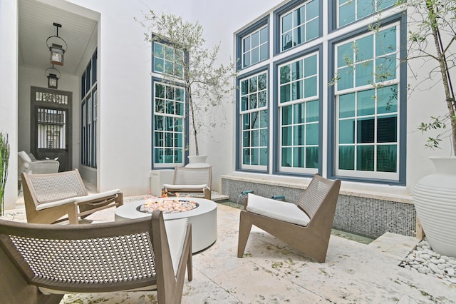 37 Sugar Loaf Aly, Alys Beach, FL 32461 - view of patio / terrace with an outdoor fire pit
