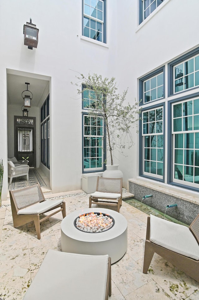 37 Sugar Loaf Aly, Alys Beach, FL 32461 - view of patio featuring an outdoor fire pit