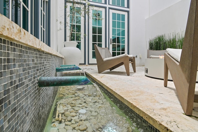 37 Sugar Loaf Aly, Alys Beach, FL 32461 - view of patio with french doors