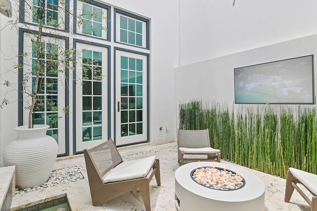 37 Sugar Loaf Aly, Alys Beach, FL 32461 - view of patio / terrace with an outdoor fire pit and french doors