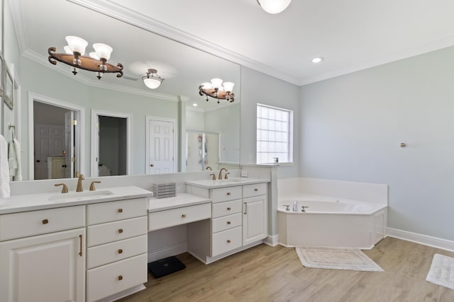 1009 Forest Shore Dr, Miramar Beach, FL 32550 - bathroom with a chandelier, vanity, wood finished floors, crown molding, and a bath