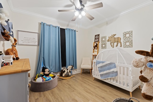 1009 Forest Shore Dr, Miramar Beach, FL 32550 - bedroom with wood finished floors, ornamental molding, and a ceiling fan