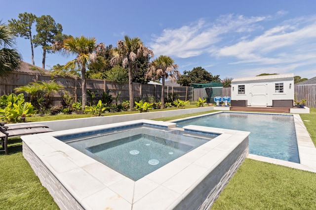 1009 Forest Shore Dr, Miramar Beach, FL 32550 - view of pool with an in-ground hot tub, a fenced backyard, and a storage shed