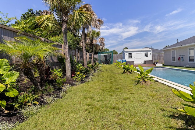 1009 Forest Shore Dr, Miramar Beach, FL 32550 - fenced backyard featuring a storage unit